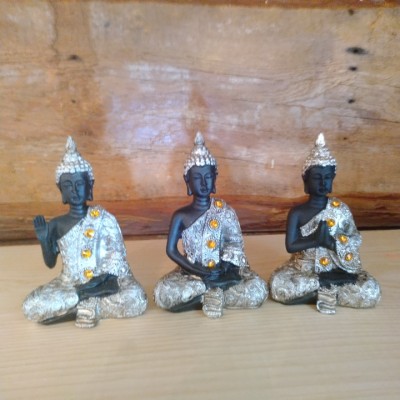 Ensemble de trois bouddha gestes symboliques